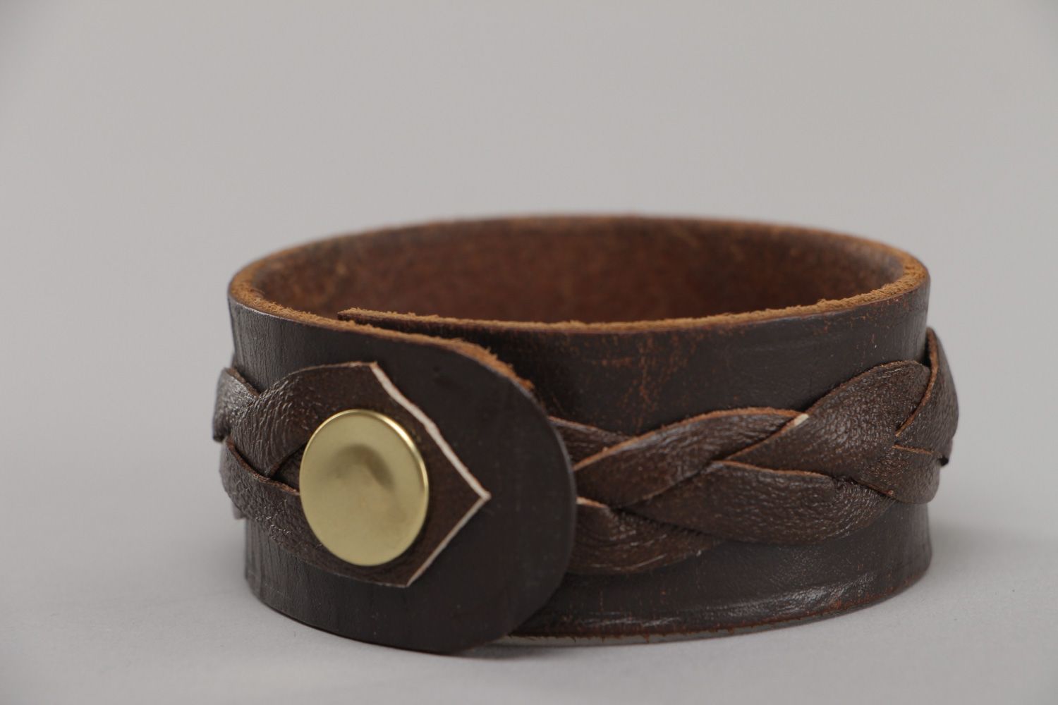 Handmade wrist bracelet woven of genuine brown leather with metal stud unisex photo 3