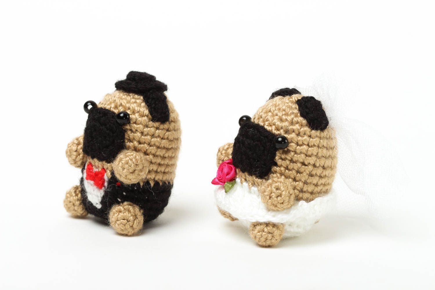 Set of two knitted stuffed pugs. Boy and girl photo 2