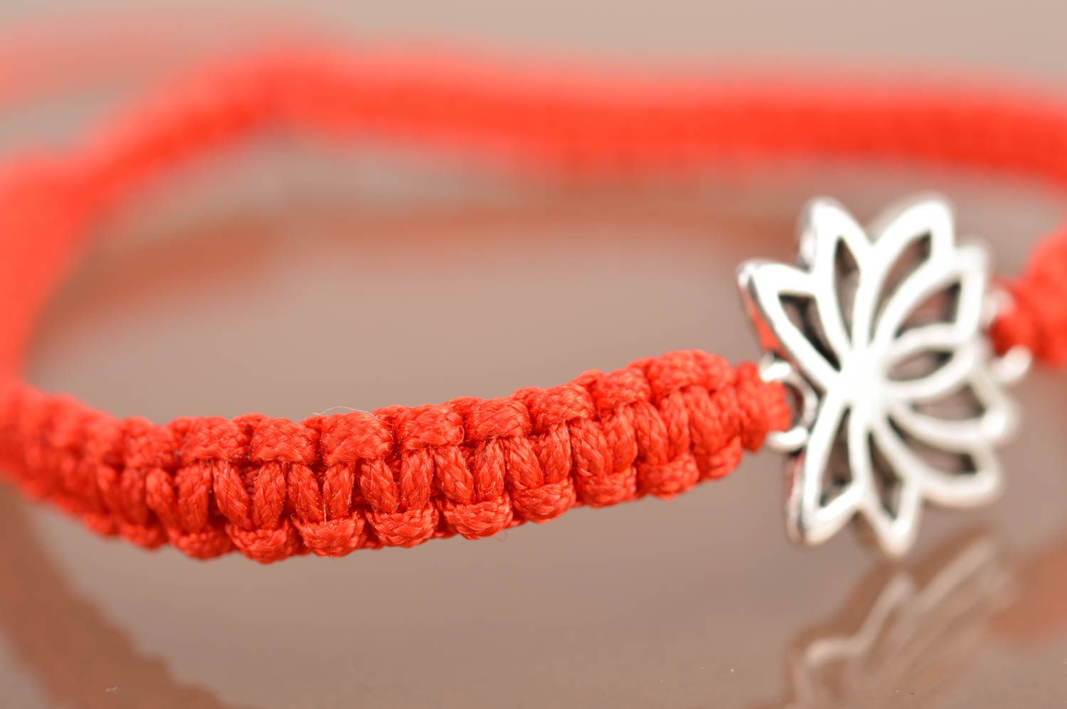 Beautiful handmade red woven silk thread bracelet with metal insert Lotus photo 4