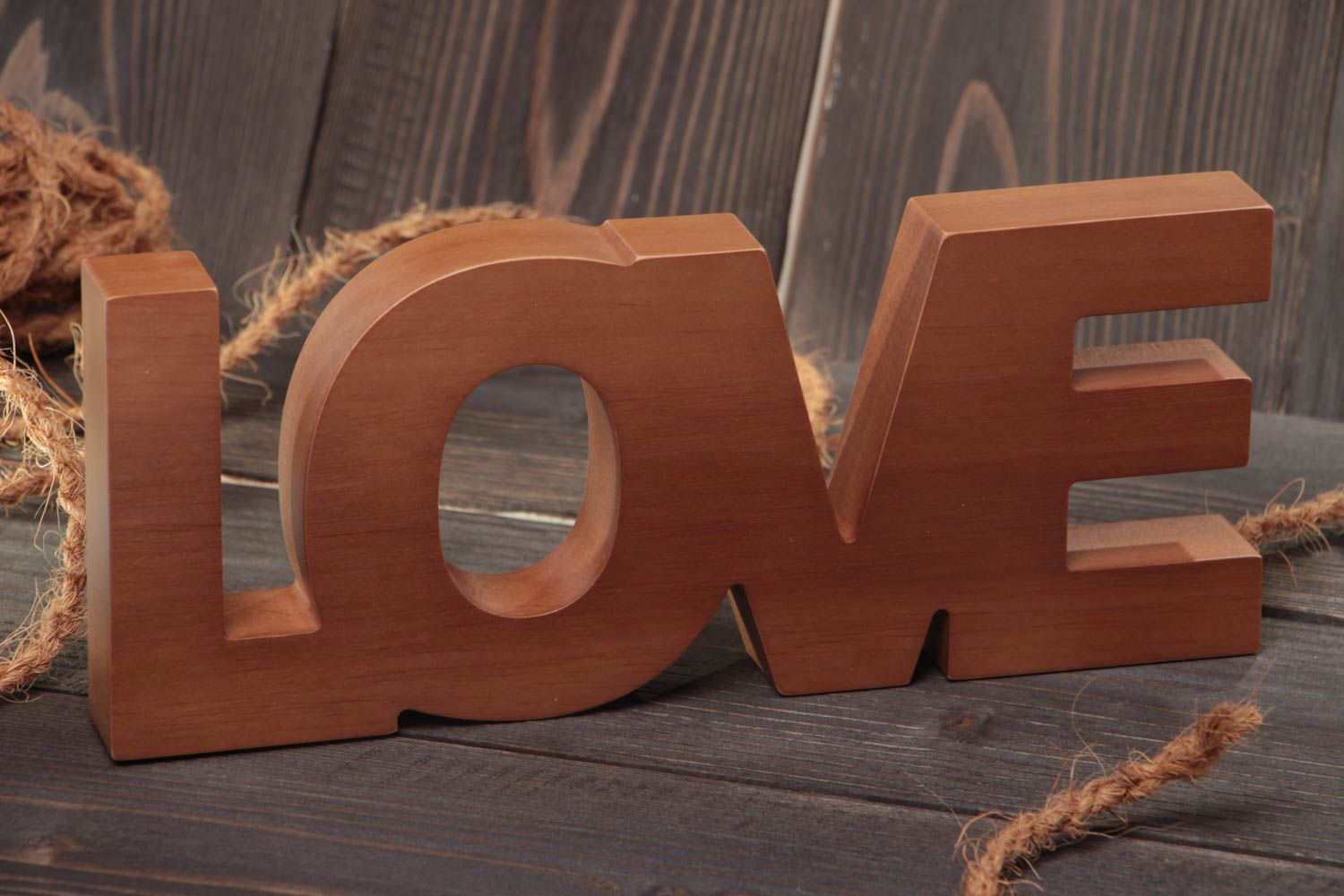 Handmade decorative volume brown word Love cut out of alder wood for interior photo 1