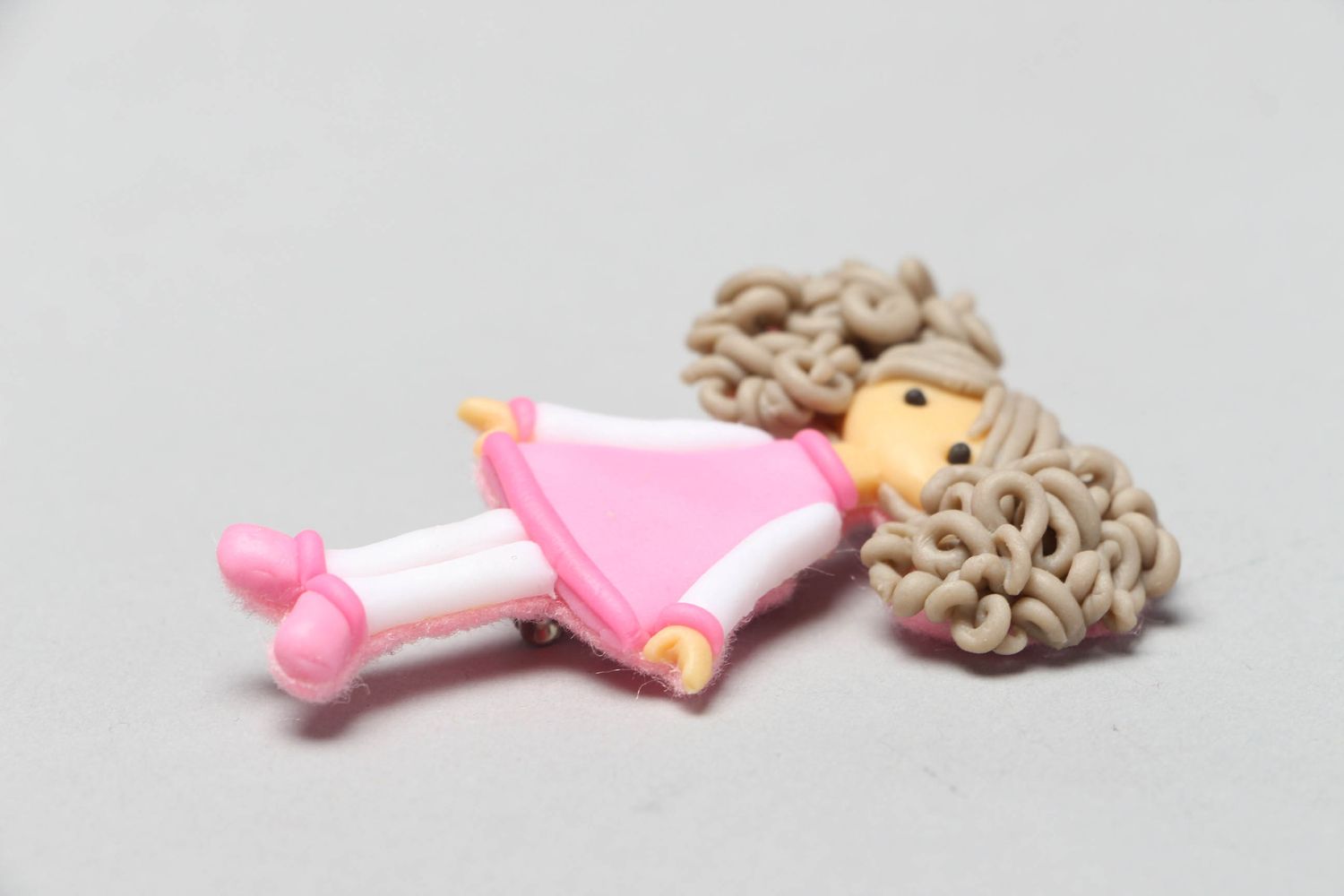 Plastic brooch in the shape of doll photo 2