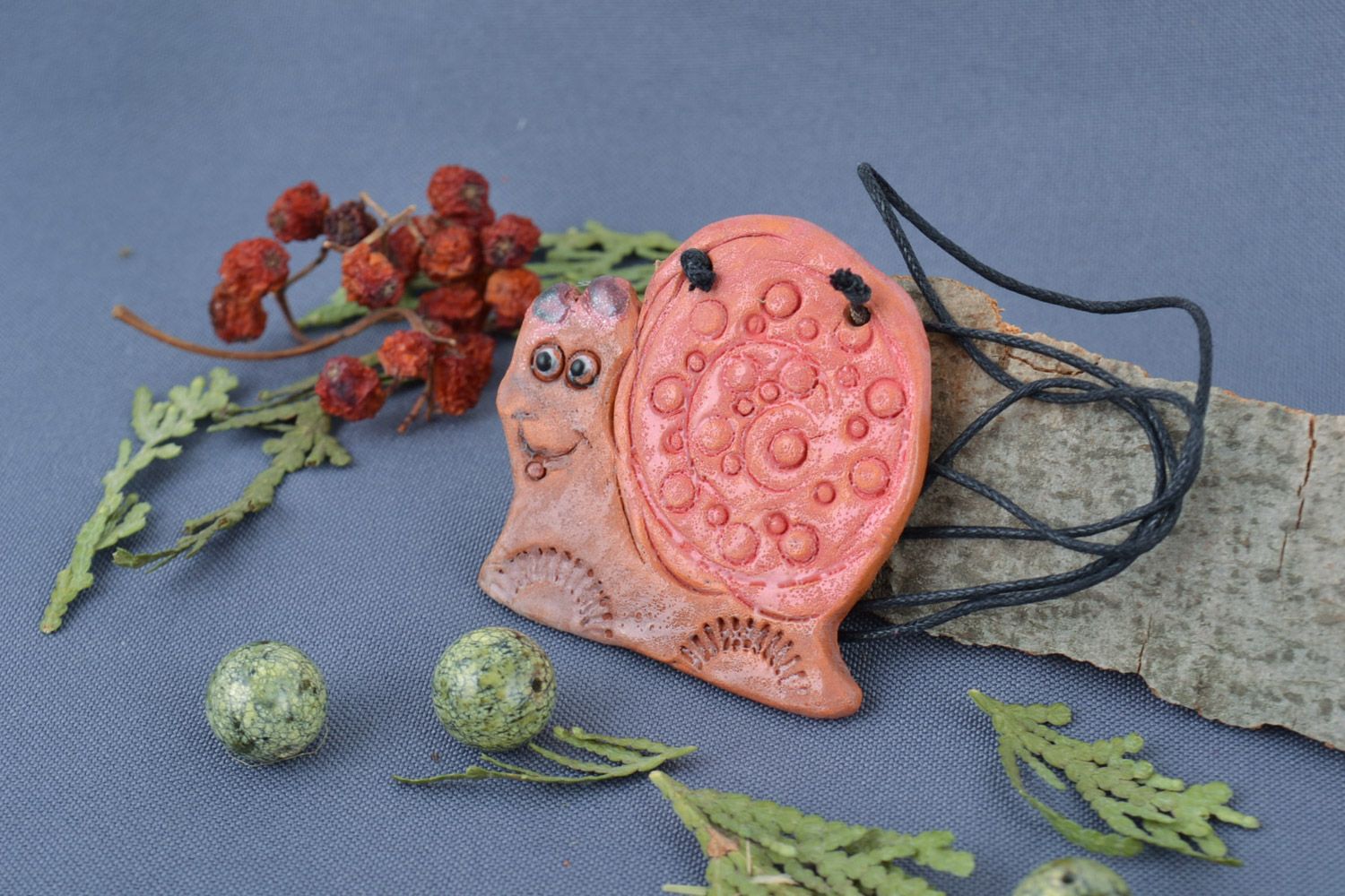 Handmade children's clay pendant in the shape of pink snail photo 1
