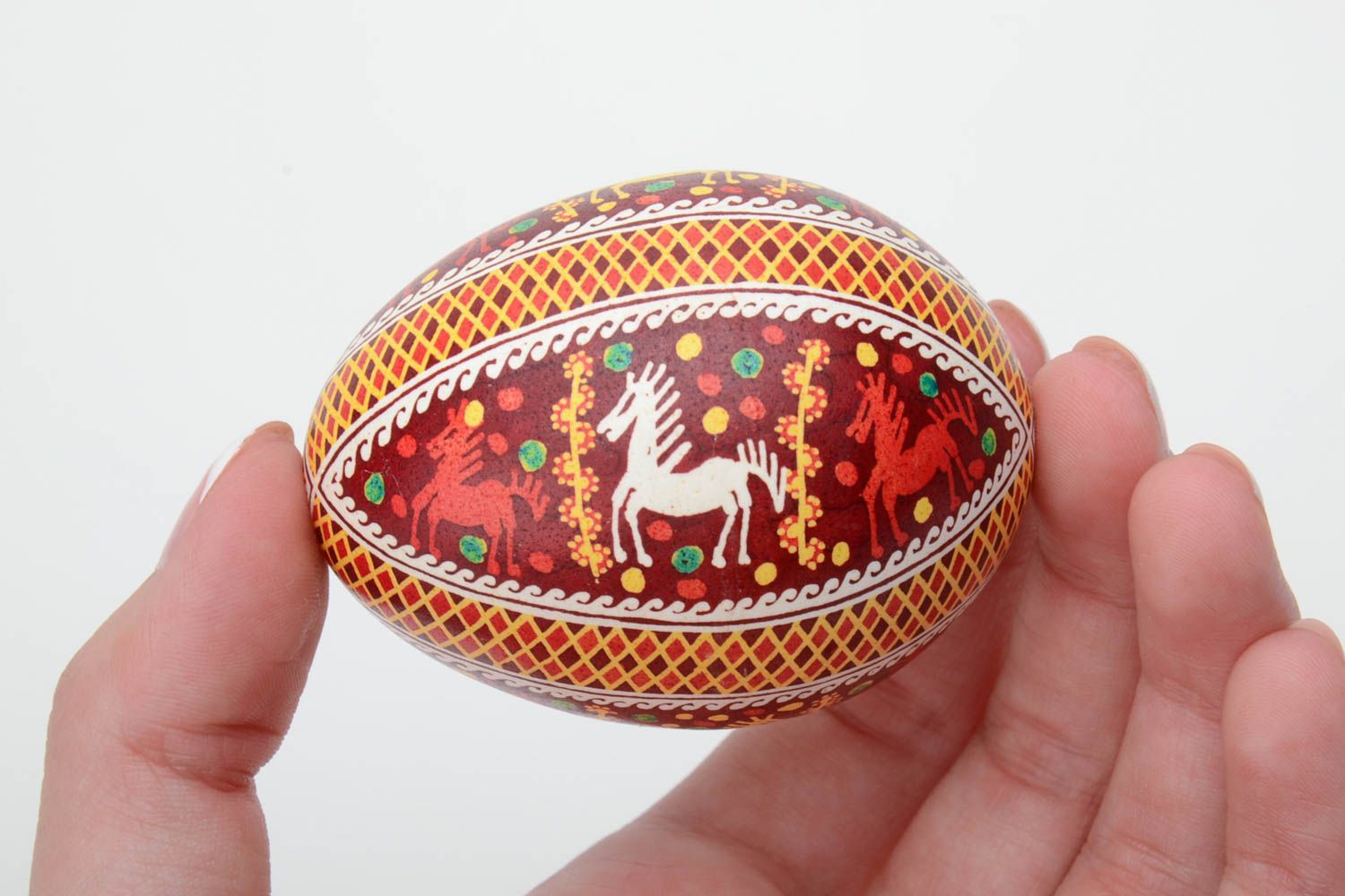 Homemade designer painted Easter egg with horse pattern created using waxing technique photo 5