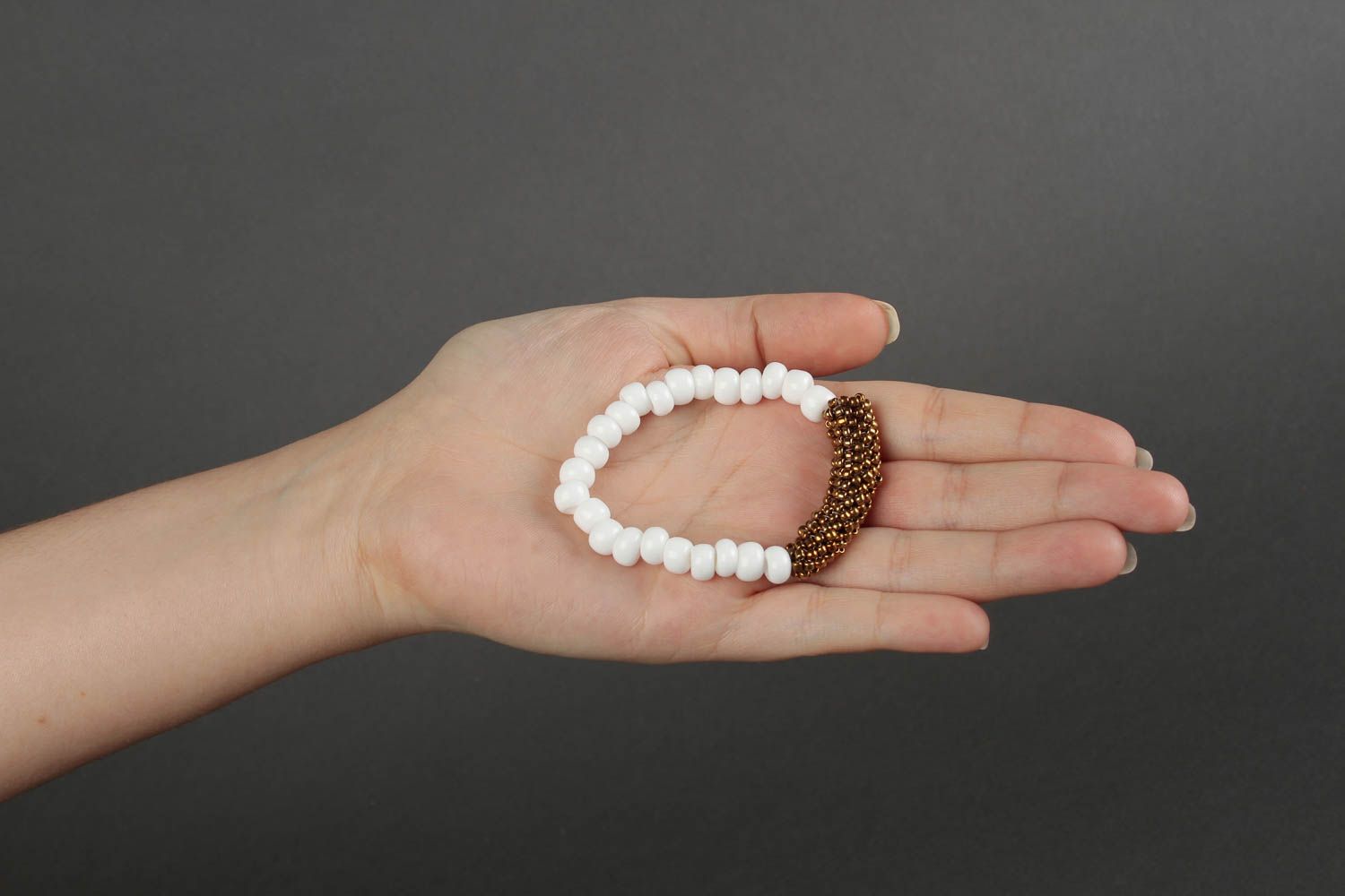 White beads bracelet with golden color centerpiece for young girls photo 3
