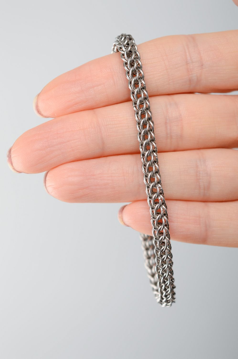 Handmade unisex bracelet made of jewelry alloy photo 3