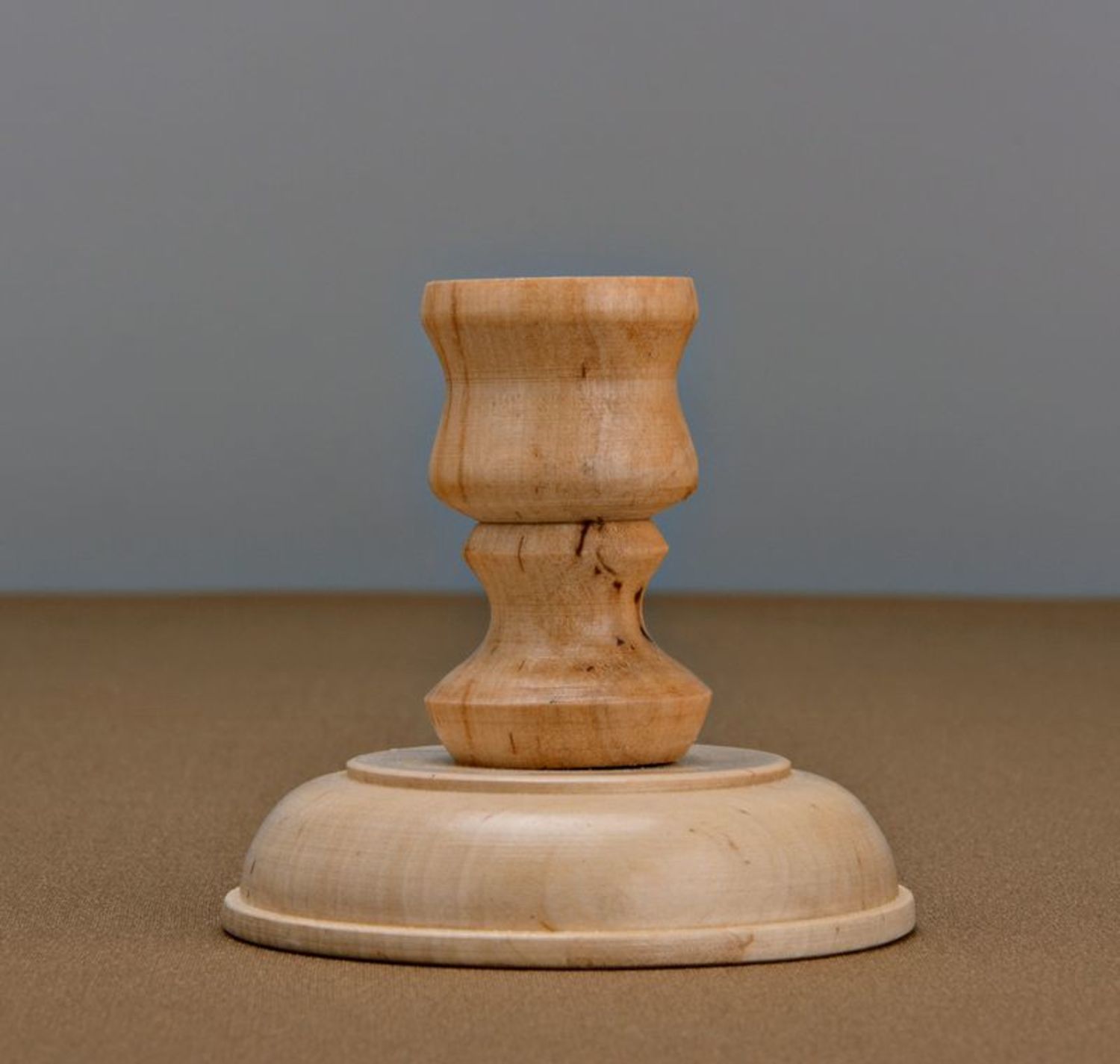 Candelero de madera para una vela foto 3