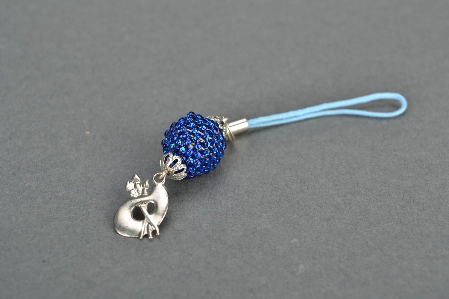 Cell phone charm of blue color photo 3