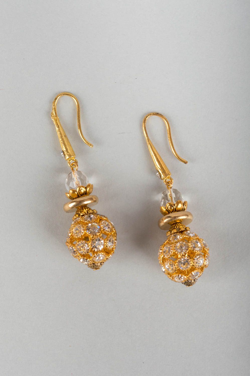 Elegant festive handmade designer long brass earrings with crystal beads photo 2