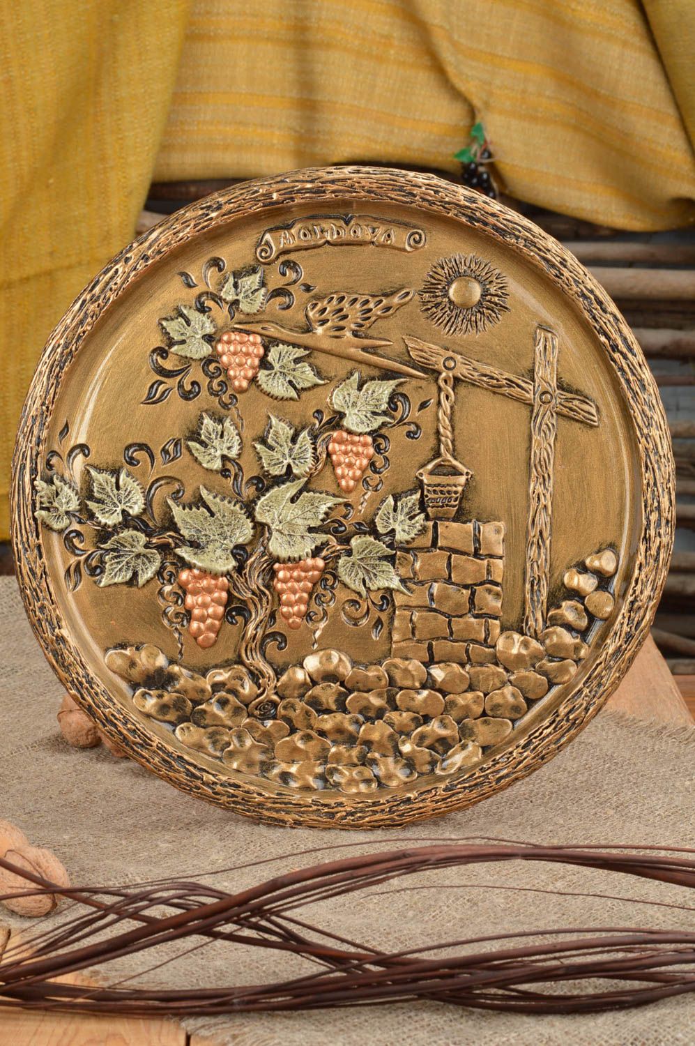 Ceramic round-shaped wall panel of golden color beautiful handmade home decor photo 1