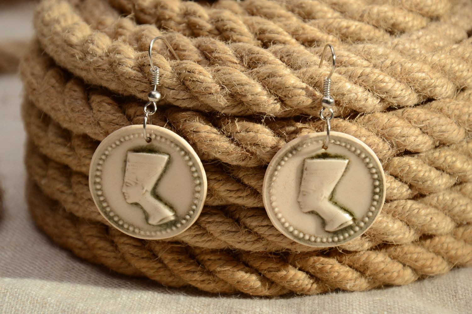 Handmade white clay round earrings in the shape of coins with embossment Nefertiti photo 1