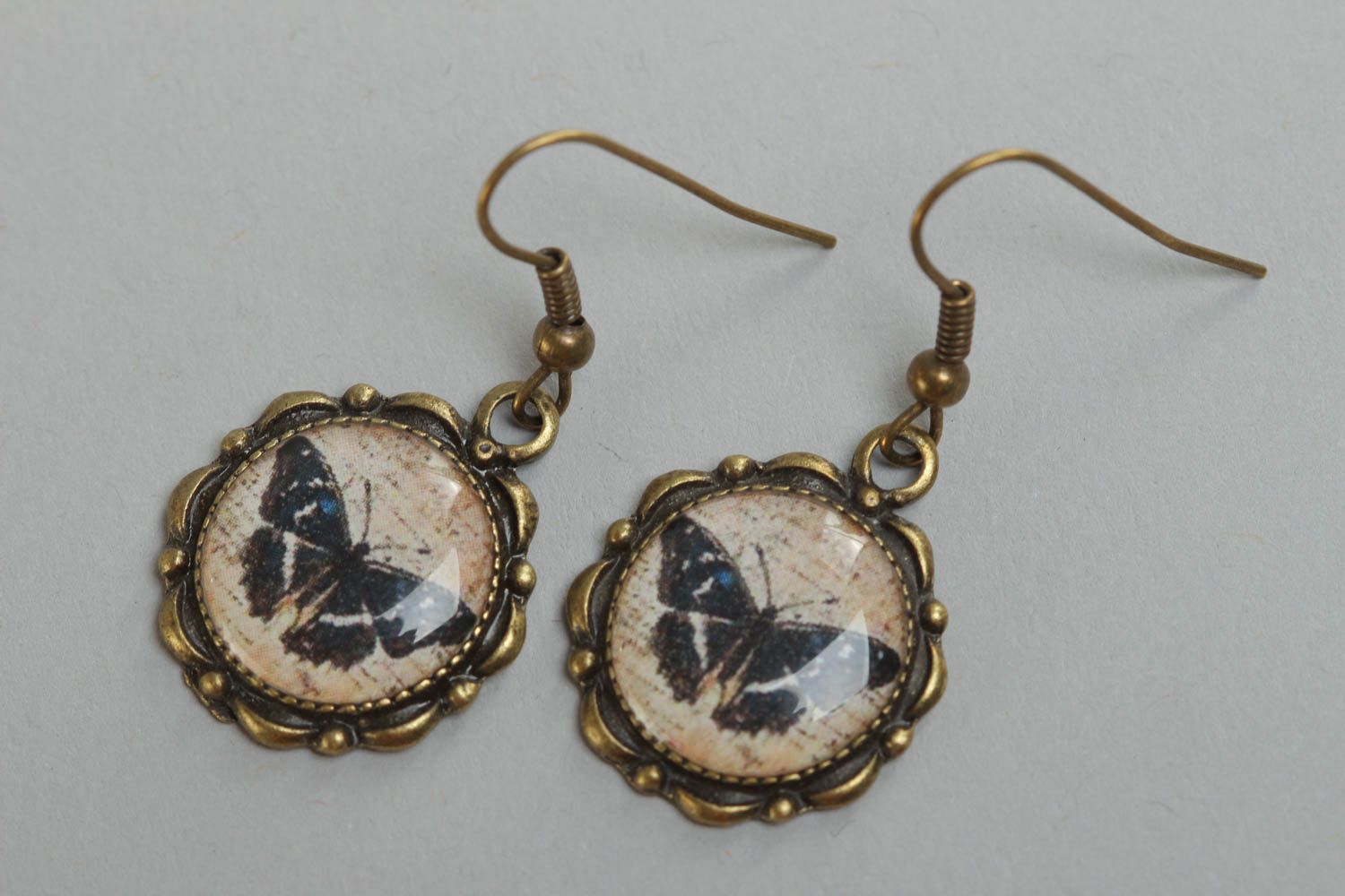 Handmade round metal and glaze earrings with butterflies photo 2