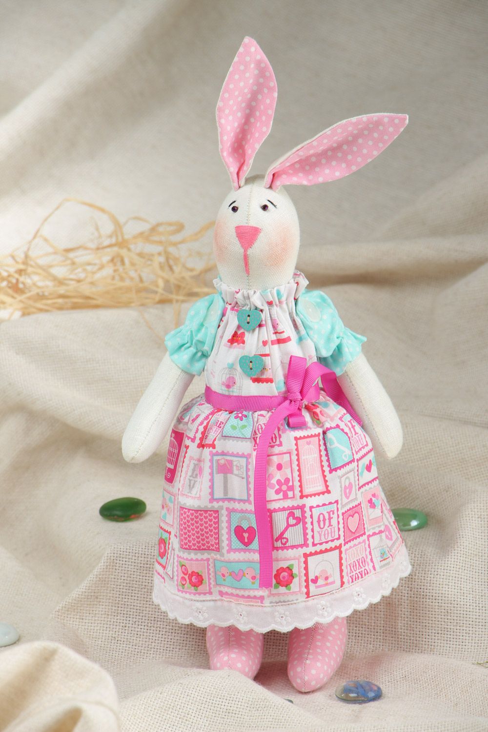 Cute handmade soft toy sewn of natural fabrics Rabbit with pink ears and dress photo 1