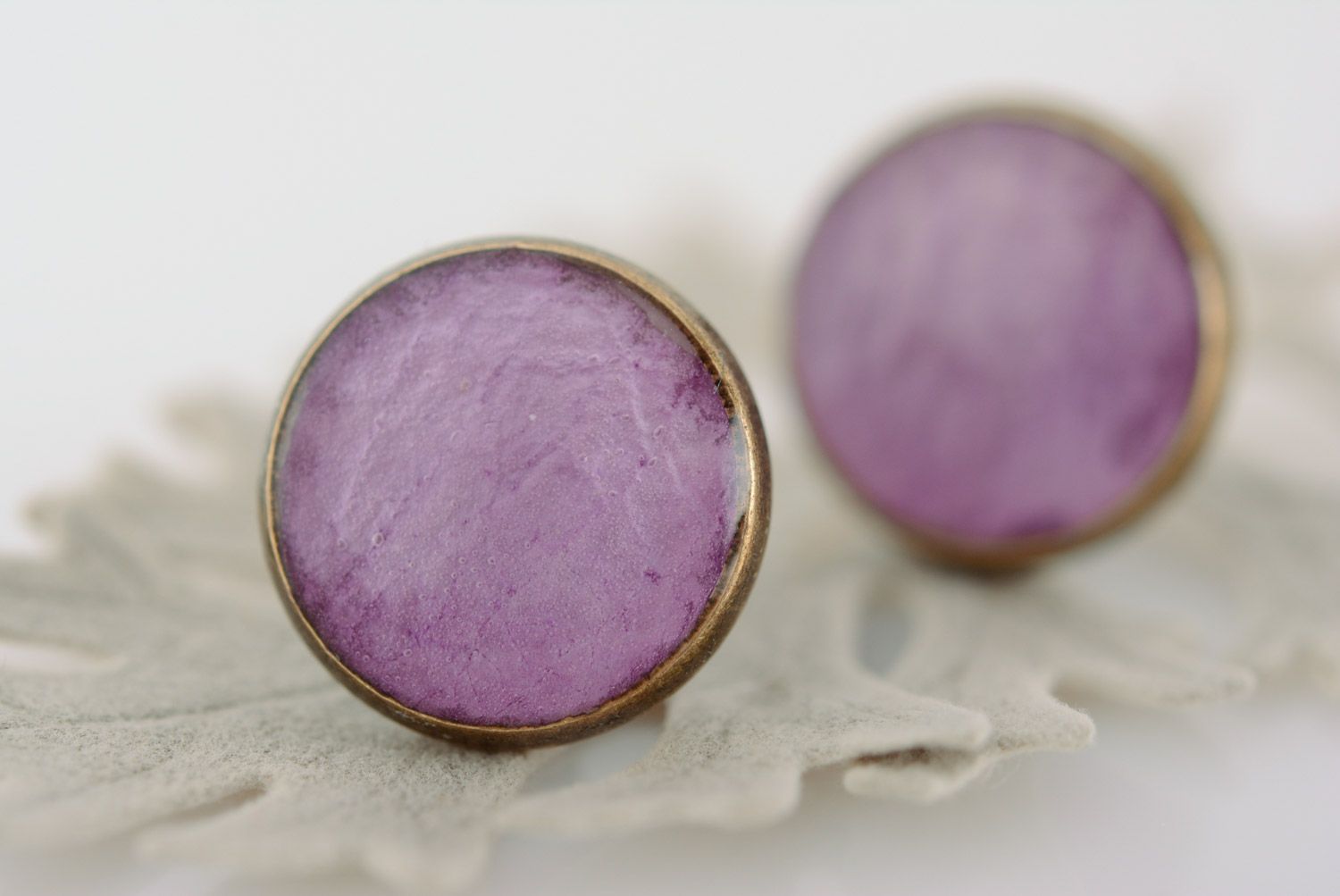Handmade round stud earrings with dried flowers in epoxy resin of violet color photo 1