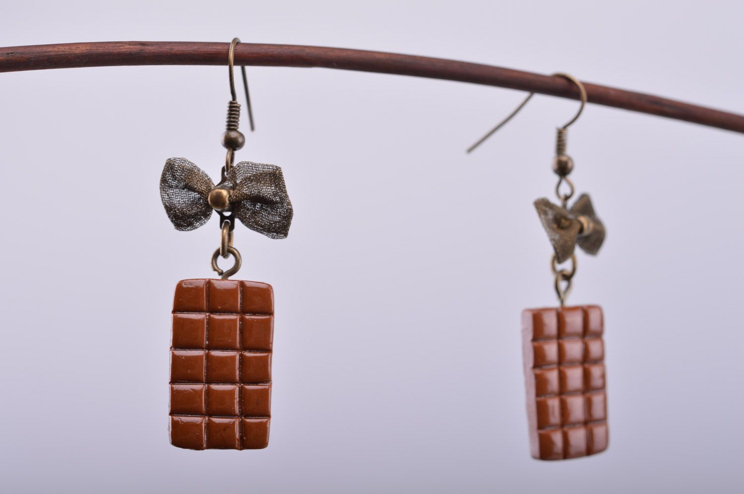Homemade plastic earrings with charms in the shape of chocolate bars photo 3