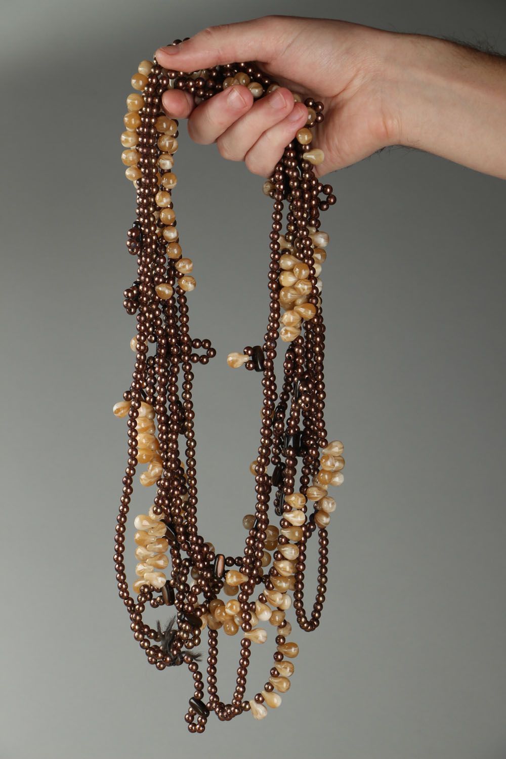 Ethnic beaded necklace in brown and beige colors photo 4