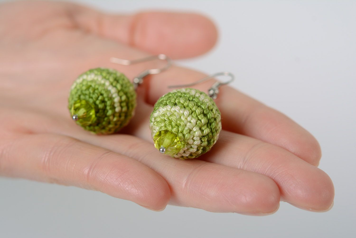 Handmade dangle earrings crocheted over with cotton threads in green color palette photo 2