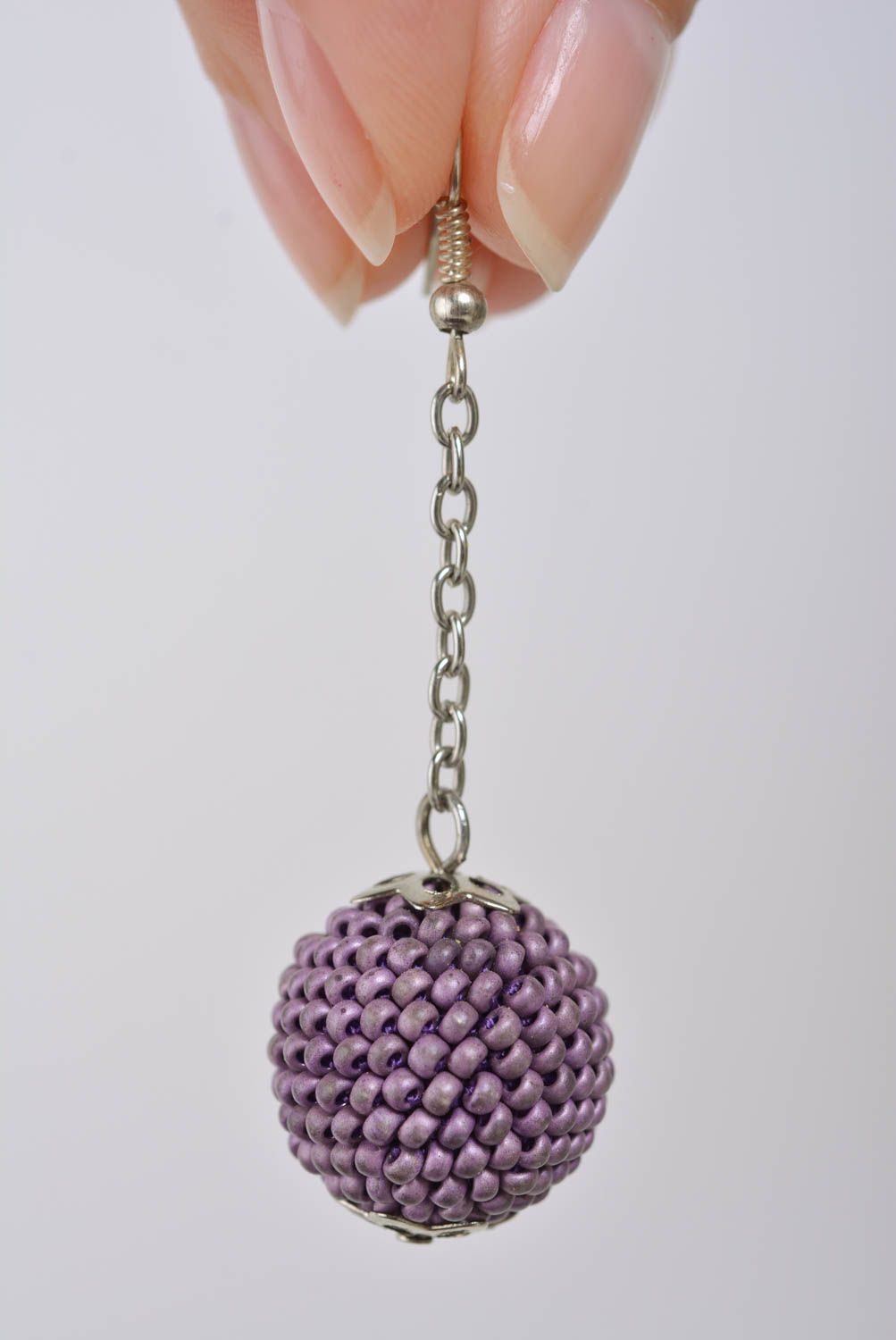 Handmade dangling earrings with bead woven violet balls and metal chains photo 4