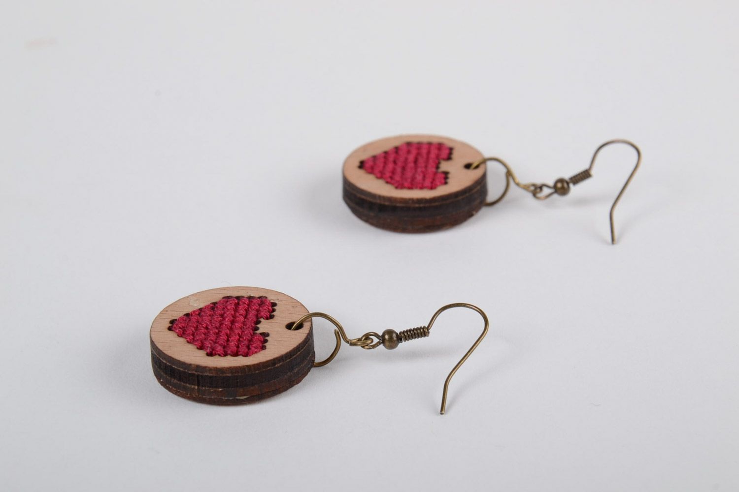 Handmade round plywood earrings with cross-stitch embroidery Red Hearts photo 2