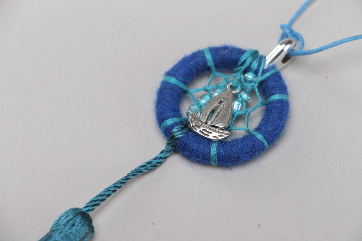 Handmade Native American dreamcatcher pendant necklace in blue color with tassel photo 4