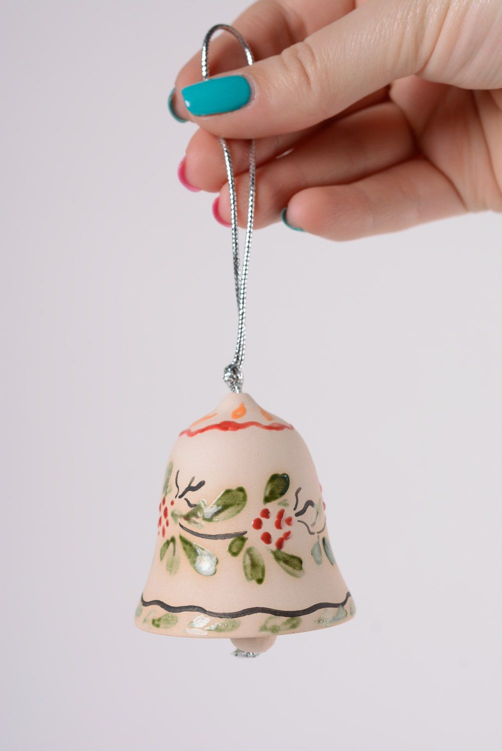 Handmade tender decorative maiolica ceramic bell with floral glaze painting photo 2