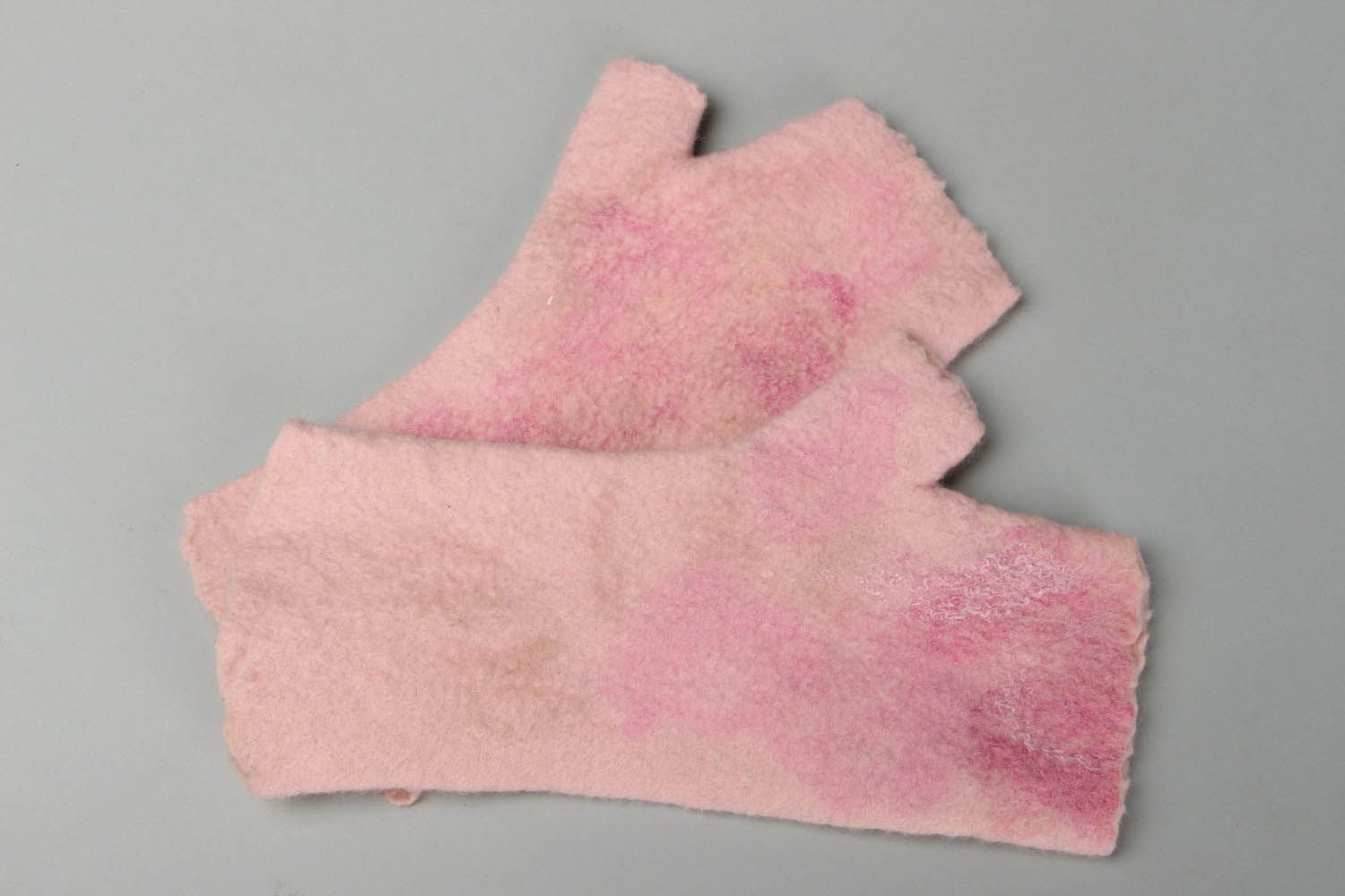 Pink mittens made of felted wool photo 1