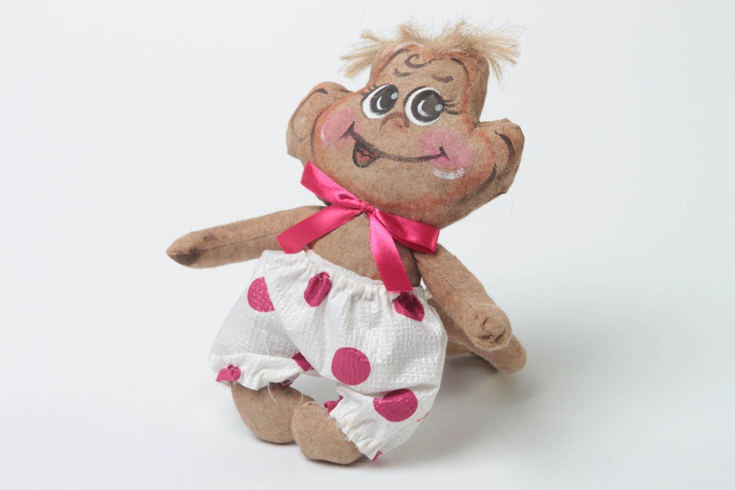 Обезьянка ручной работы декоративная мягкая игрушка с розовым бантиком  фото 2