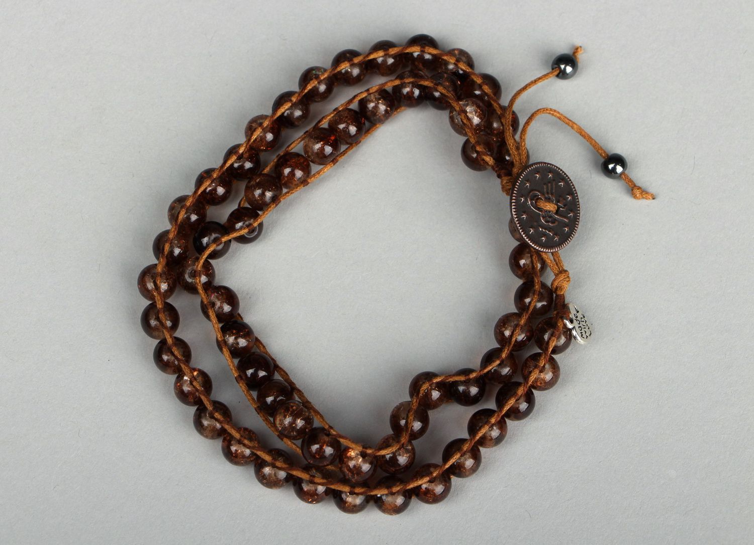 Bracelet en perles marron fait main photo 2
