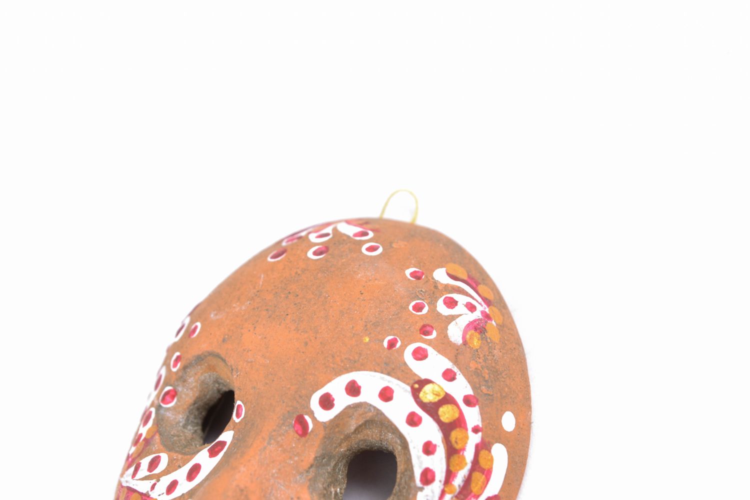 Máscara de carnaval de arcilla roja pintada  foto 5