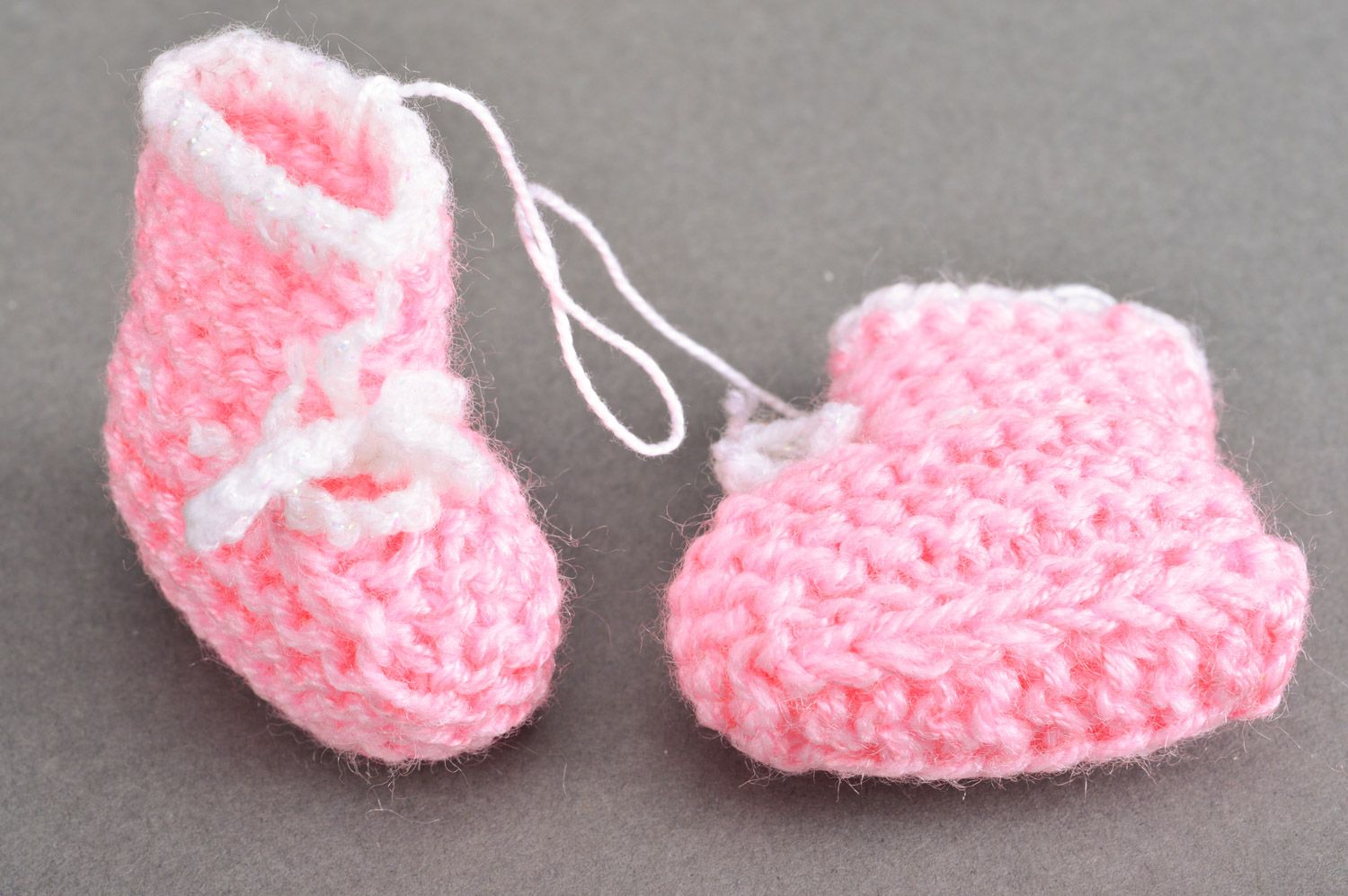 Handmade decorative wall hanging baby shoes knitted of semi-woolen pink threads photo 5