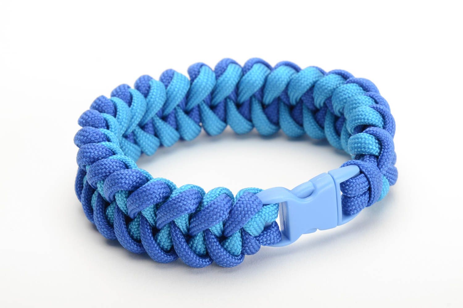 Handmade wrist survival bracelet woven of blue parachute cord with plastic fastener photo 3