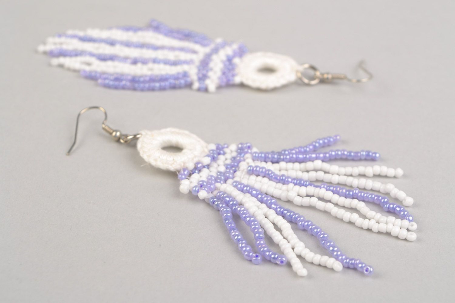 Long handmade earrings with beaded and thread charms of white and purple color photo 5