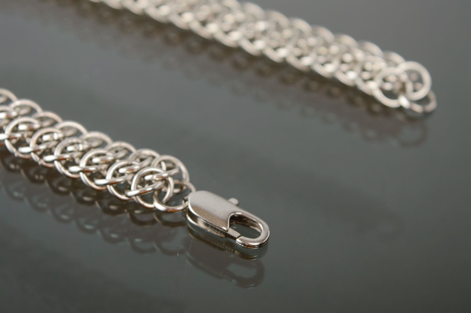 Handmade bracelet woven of jewelry alloy elements photo 5