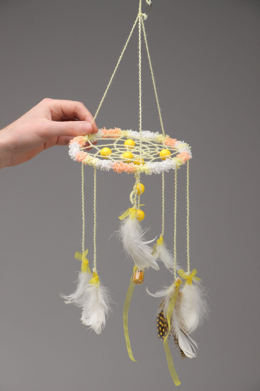 White and yellow homemade dreamcatcher wall hanging with feathers Sun Ray photo 5
