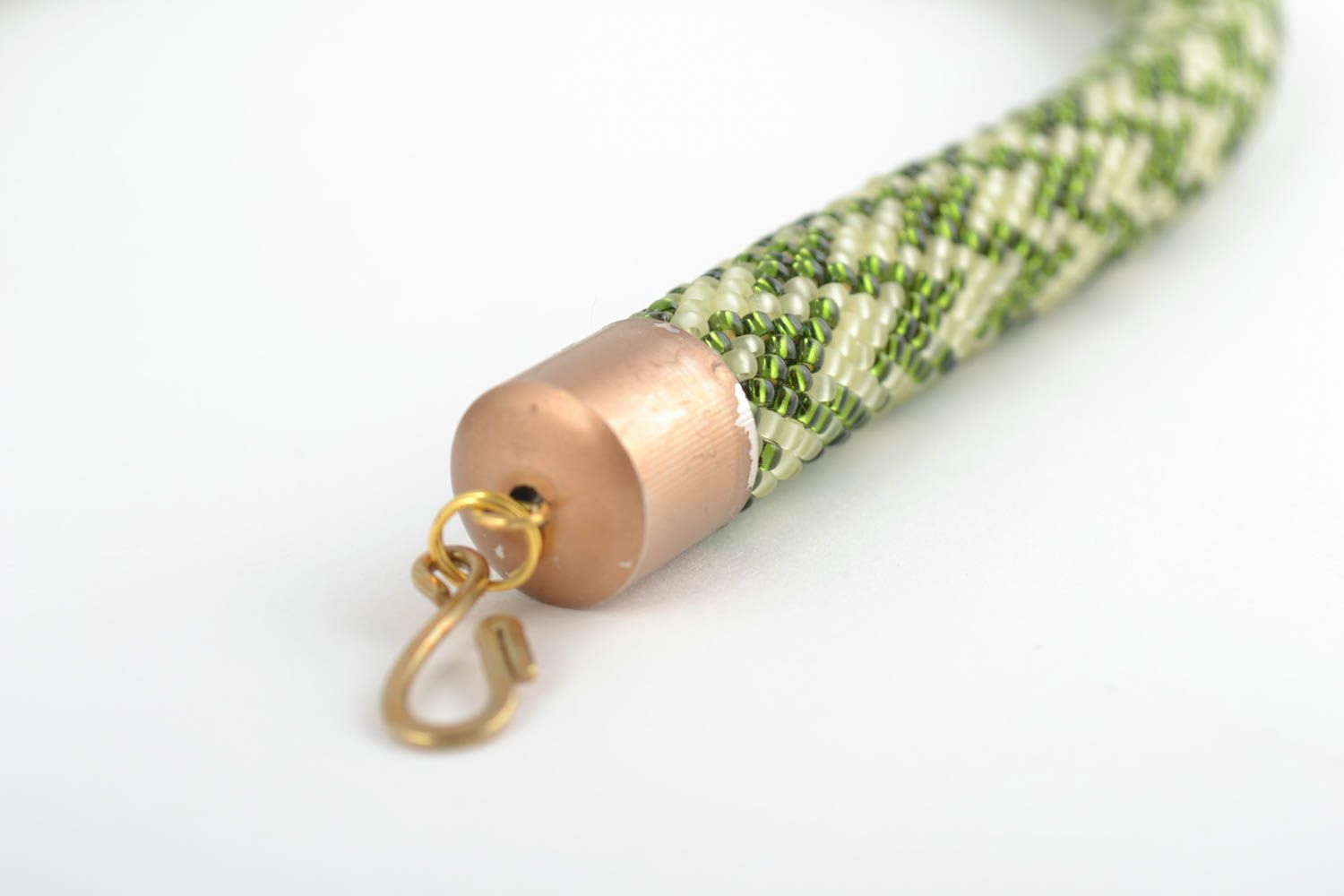 Beige and green handmade beaded cord necklace with geometric pattern photo 3