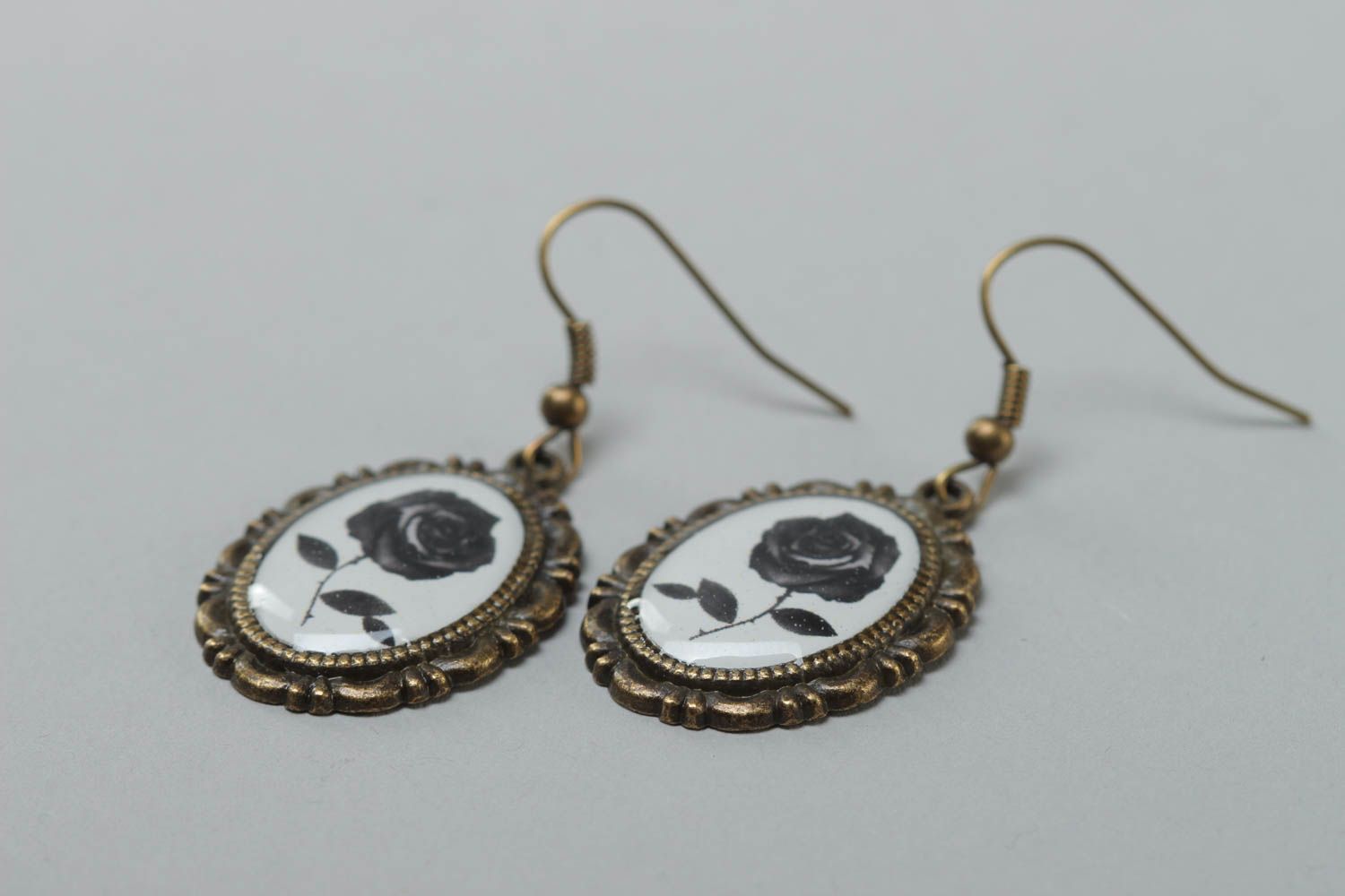 Handmade oval metal earrings with imagery of black roses coated with glass glaze photo 3