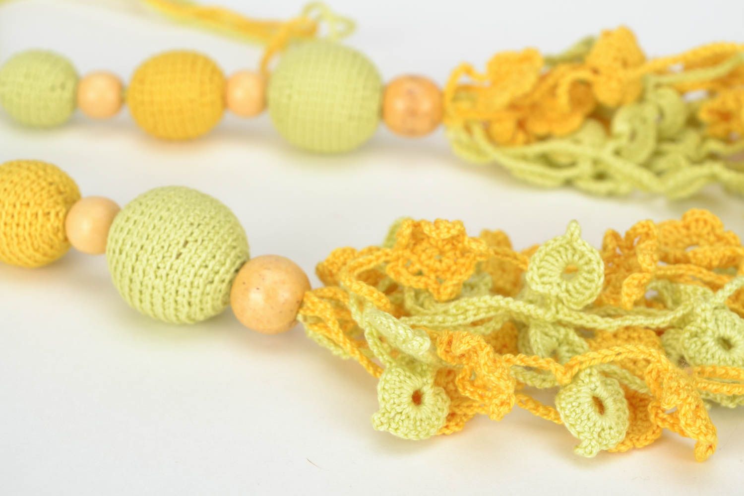 Handmade yellow bead necklace crocheted over with cotton threads with ties photo 4