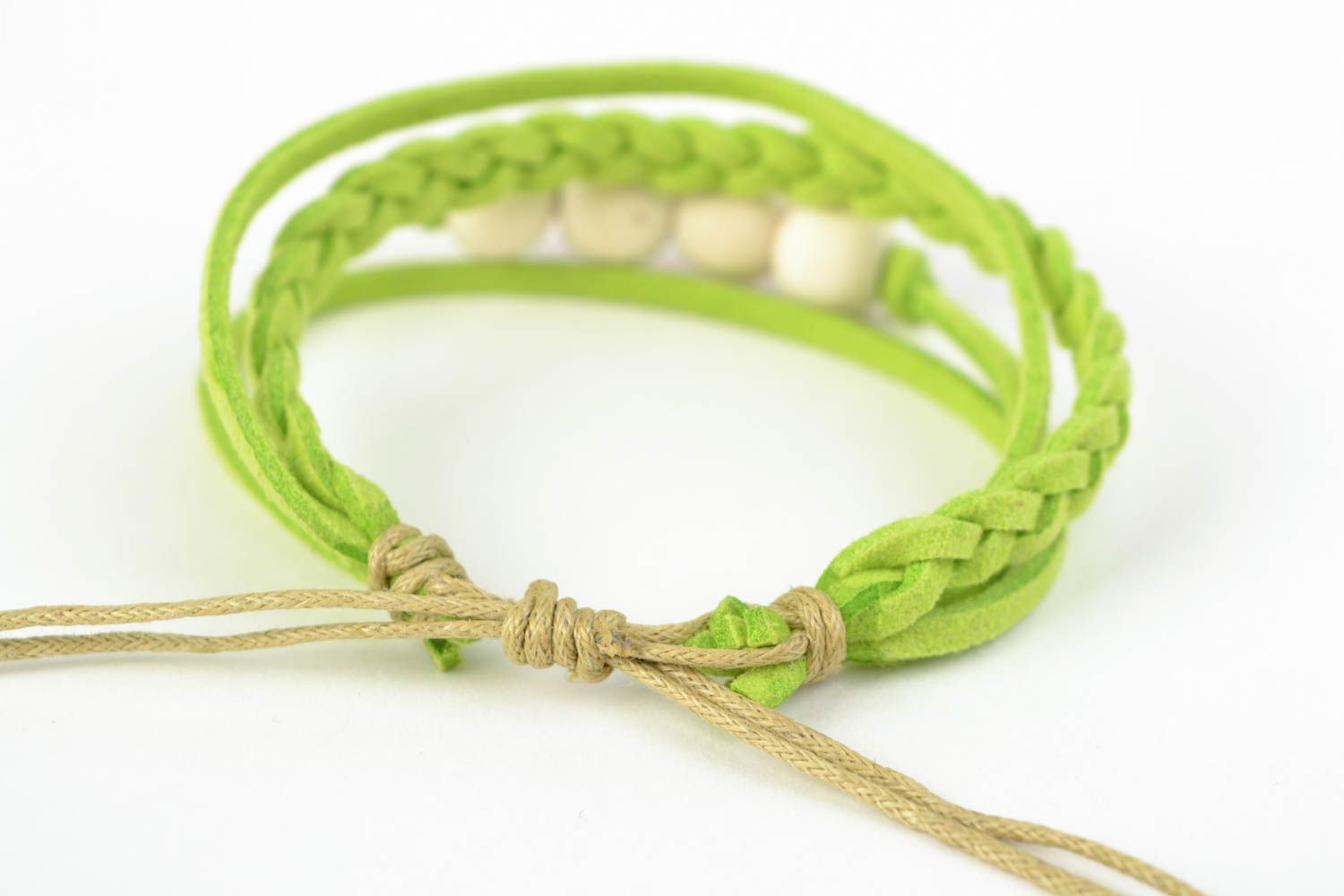Handcrafted palegreen bracelet made of cotton threads interwined with wooden handmade beads photo 4