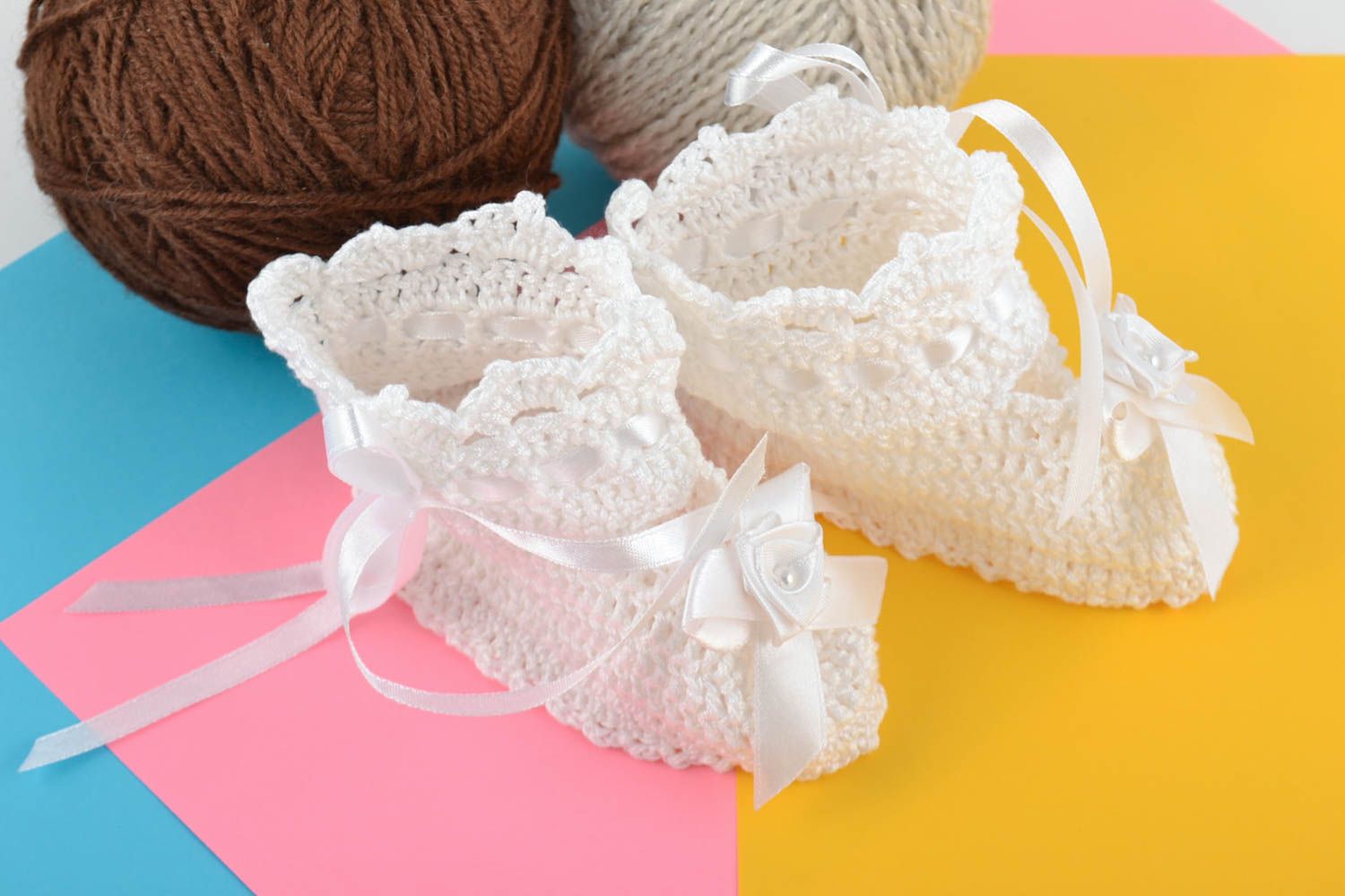 Handmade snow white lacy baby booties crocheted of cotton threads with bows photo 1