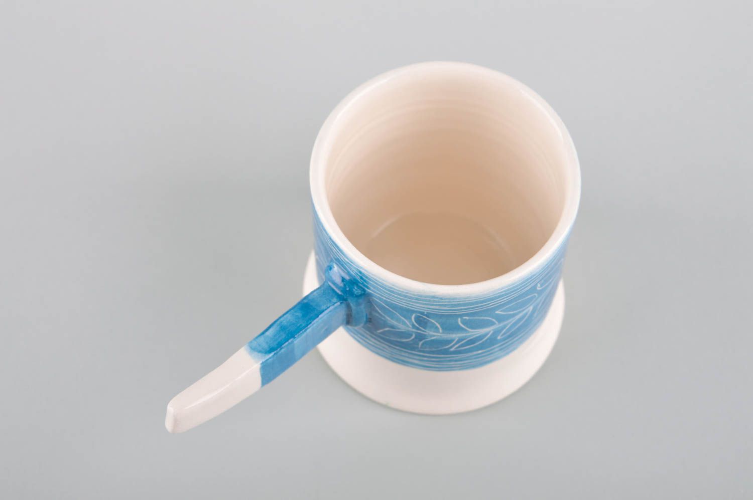 Art ceramic glazed white and blue coffee mug with stick shape handle photo 3