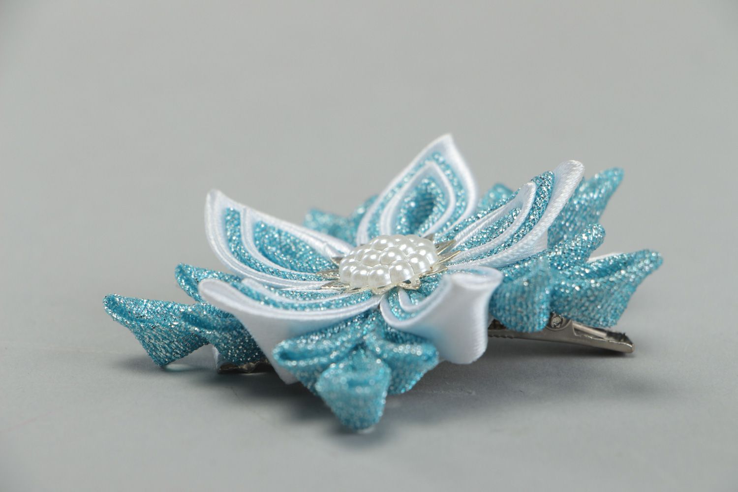 Handmade hair clip with kanzashi flower made of gold cloth and satin in blue color photo 2