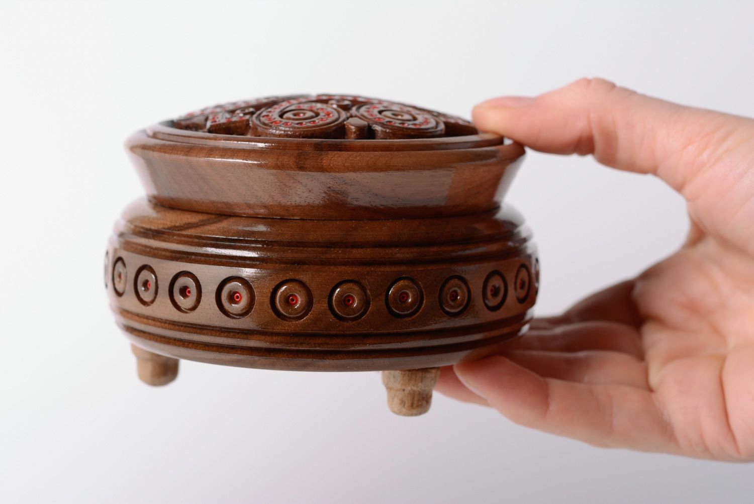 Round handmade jewelry box carved of wood and inlaid with beads on legs photo 5