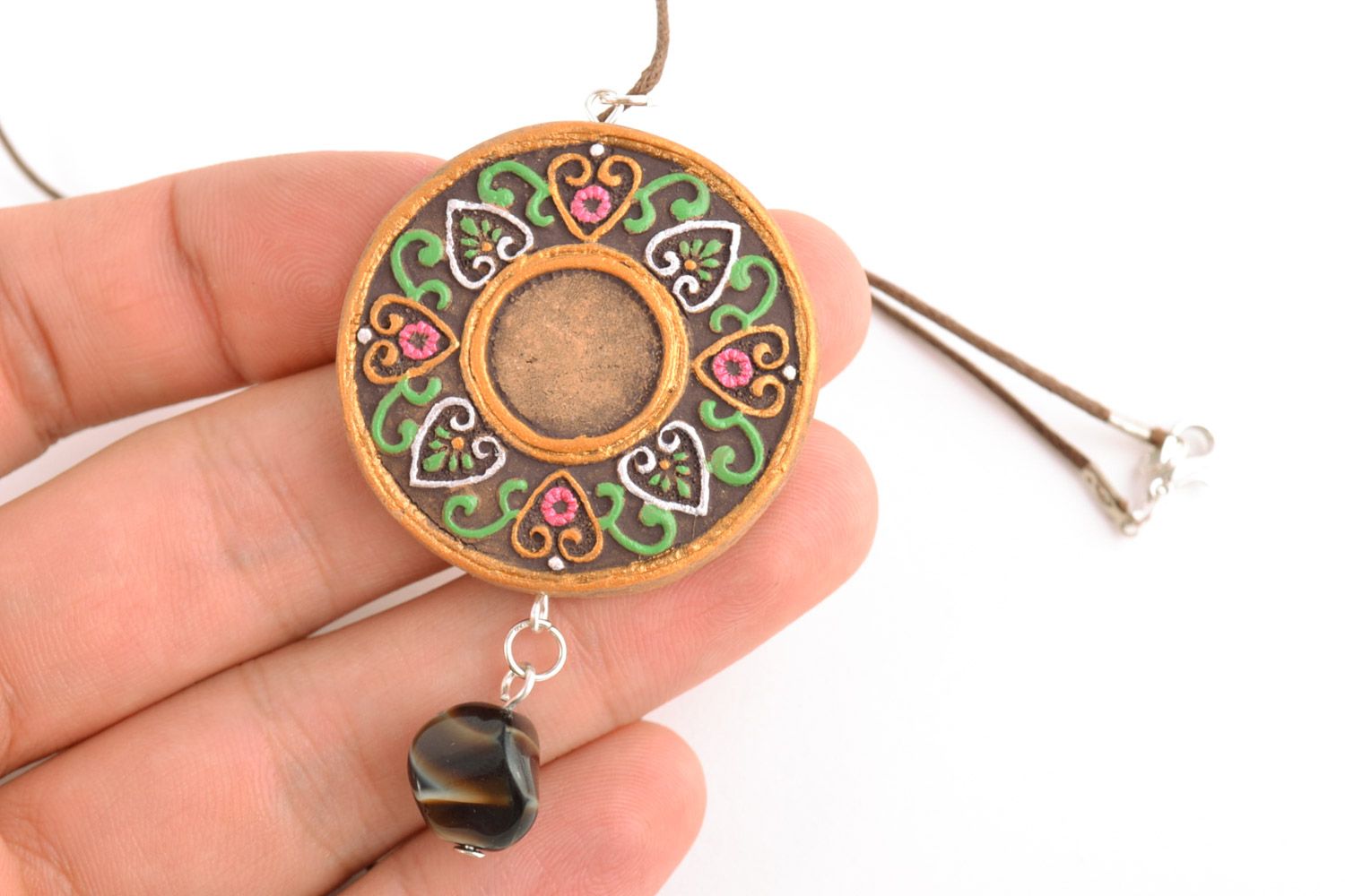 Handmade round ceramic pendant with floral ornament painted with acrylics on cord photo 2