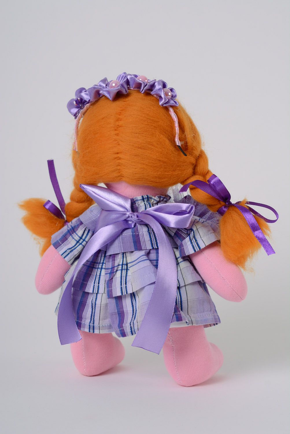 Handmade fabric doll of average size with two braids in dress photo 4