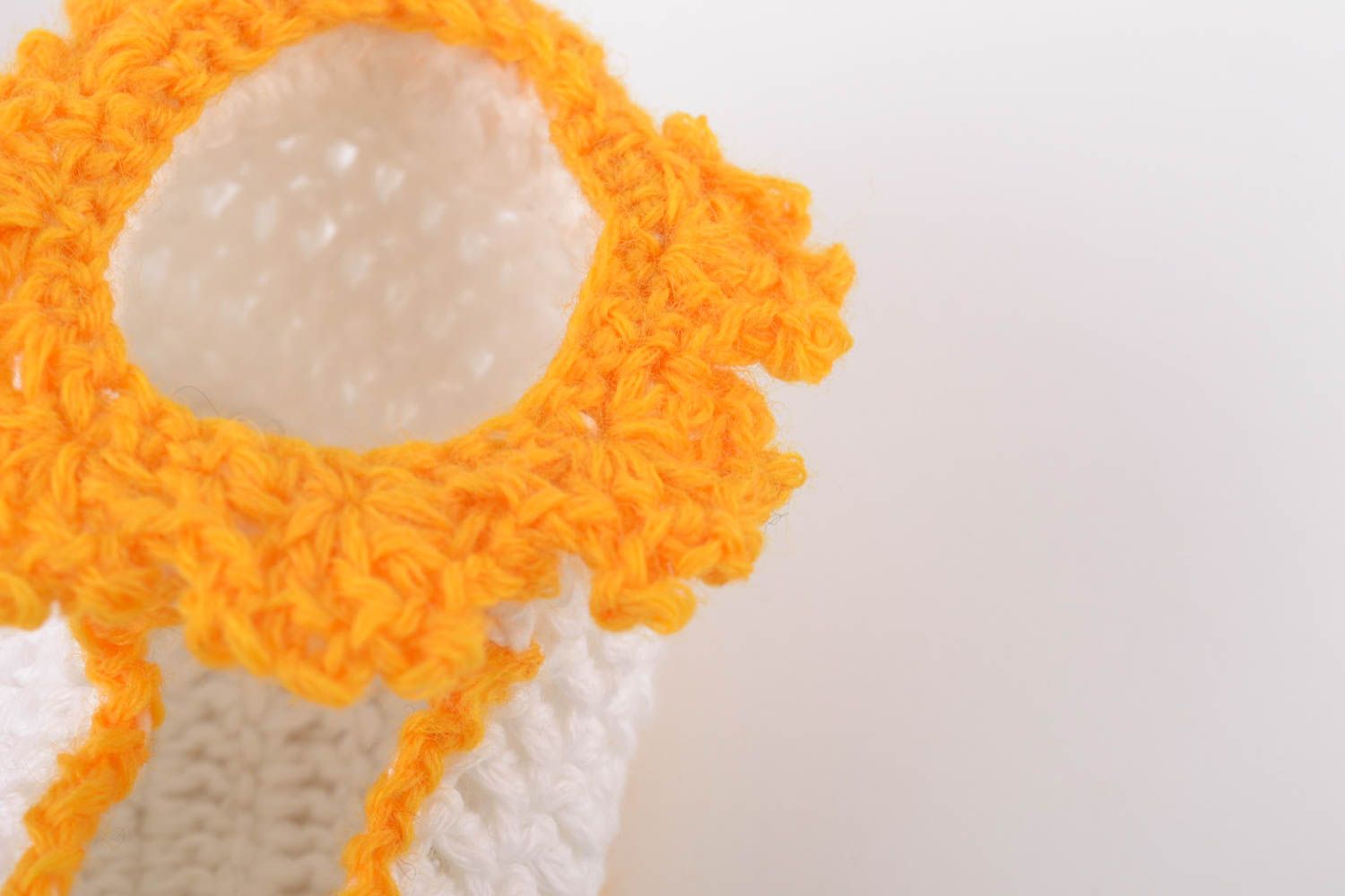 Handmade baby booties crocheted of natural white and orange cotton threads photo 3