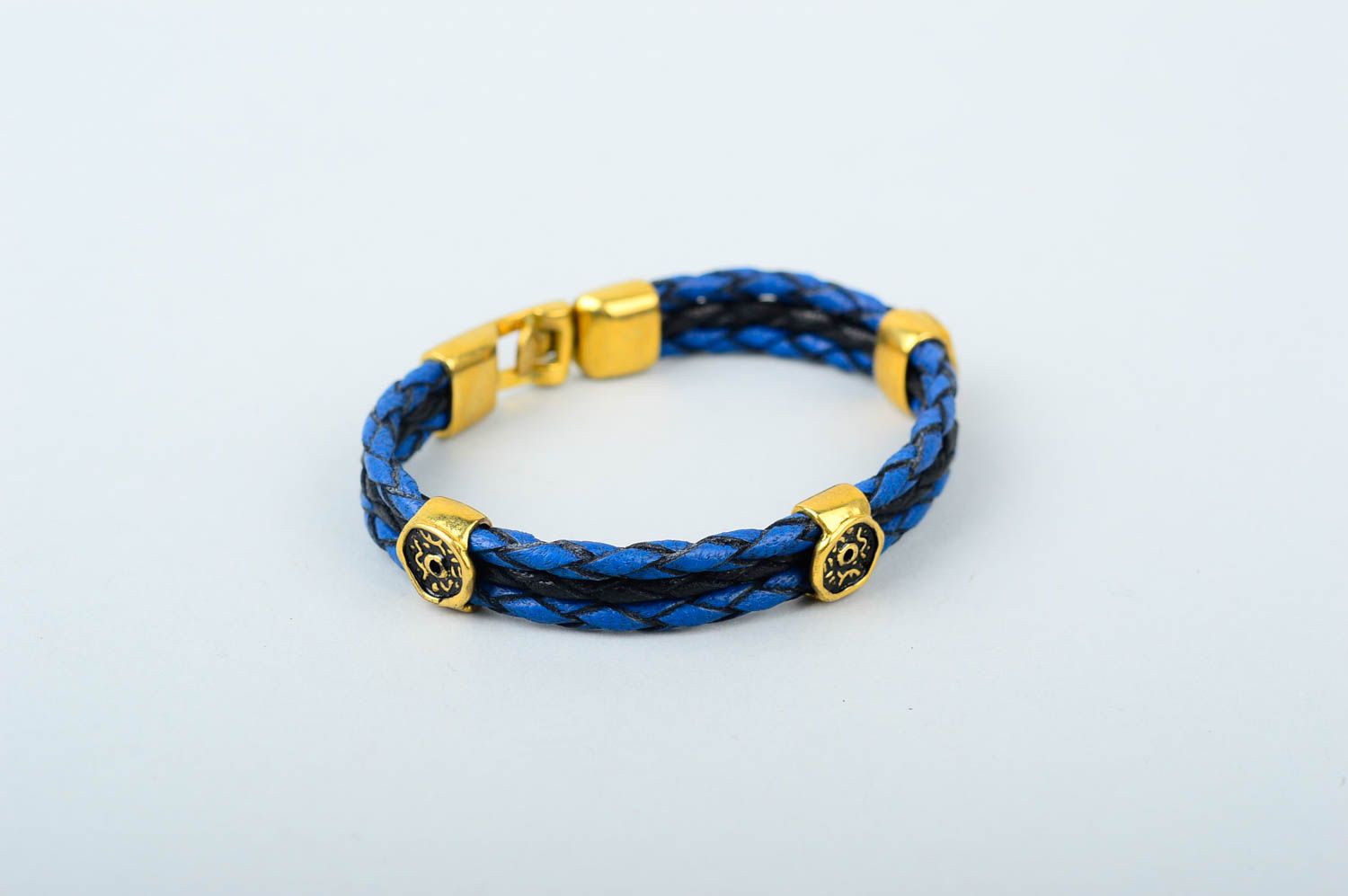 Кожаный браслет ручной работы синий браслет на руку украшение из кожи плетеное фото 1
