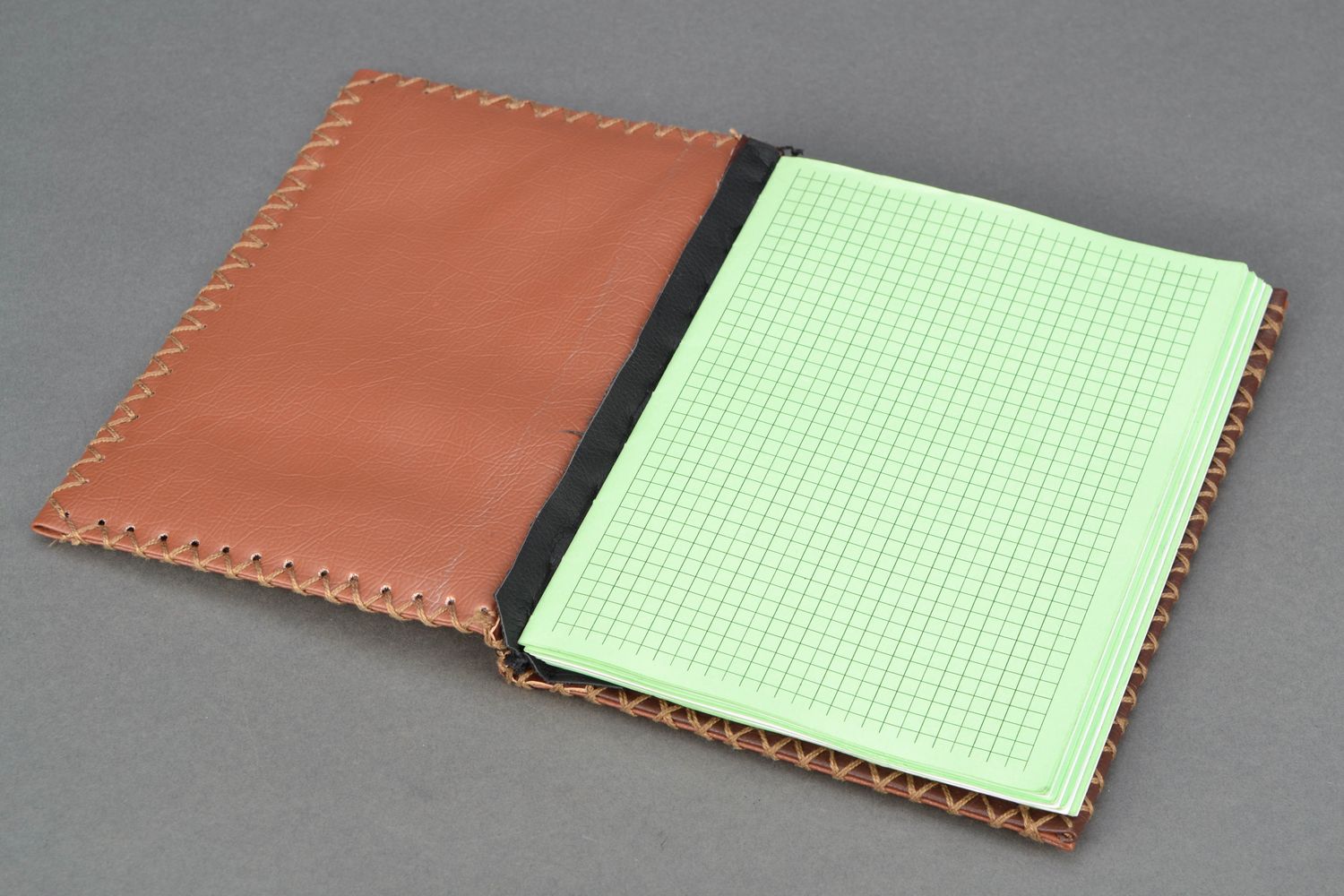 Hand bound notebook with artificial leather cover photo 3