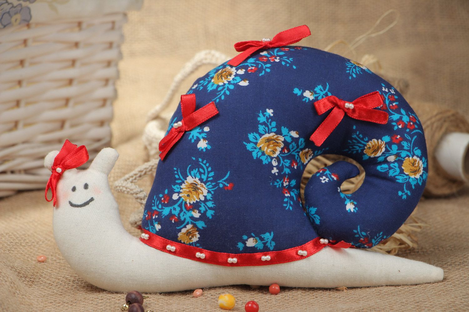 Handmade soft toy sewn of colorful bright cotton and linen with bows Snail photo 1