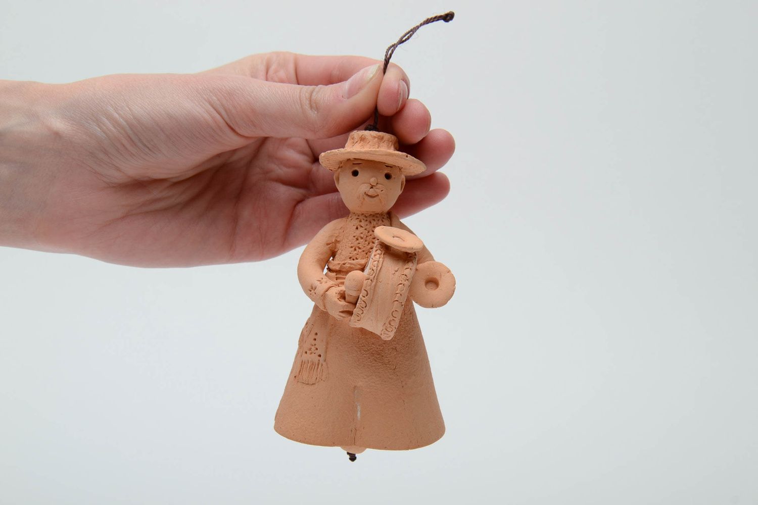 Folk clay bell toy photo 5