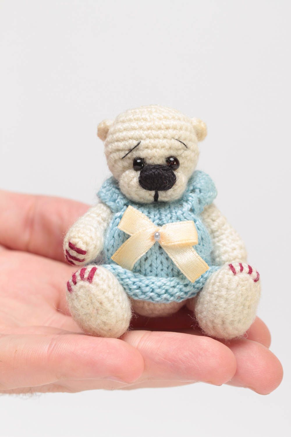 Handmade small crocheted soft toy beige bear girl in blue dress with bow photo 5