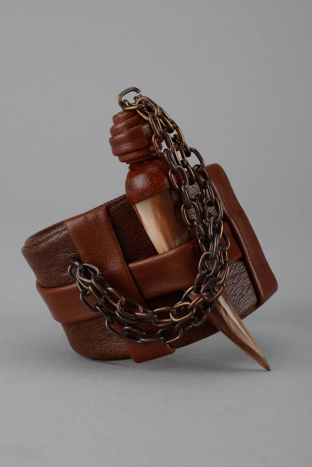 Leather bracelet with horn photo 1